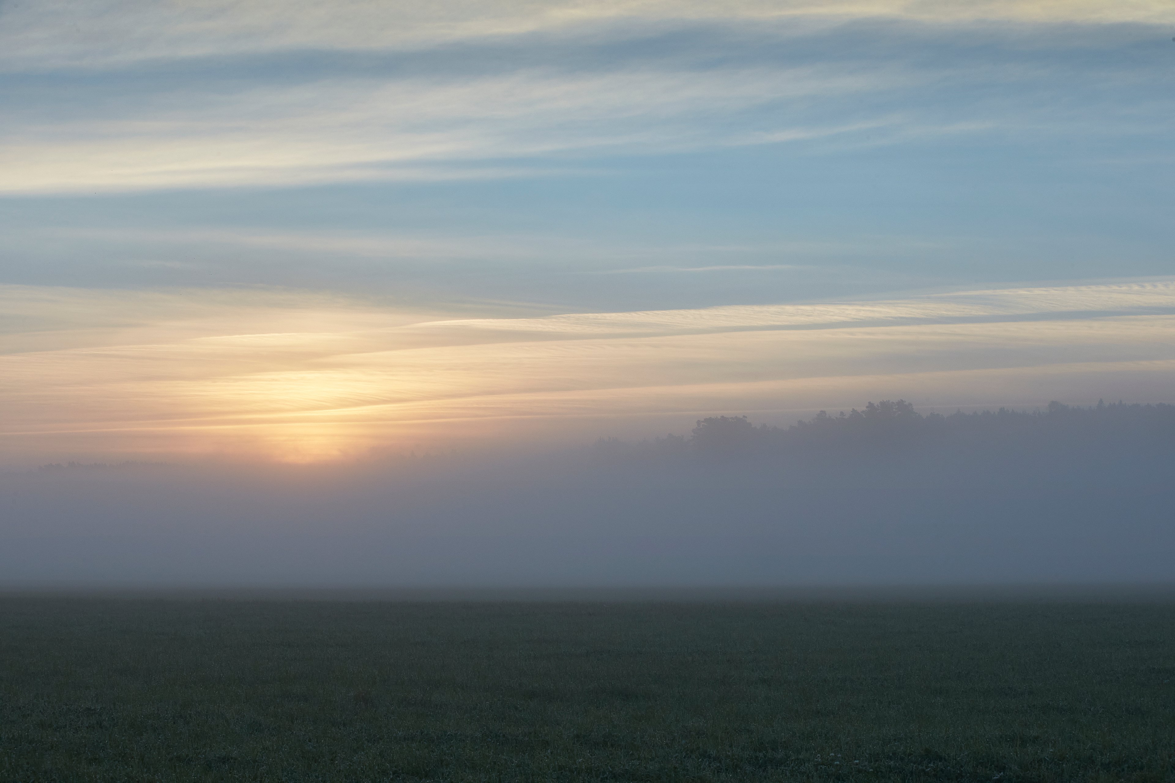 The sun sets over the Swedish countryside, home of Stena Metall Group.